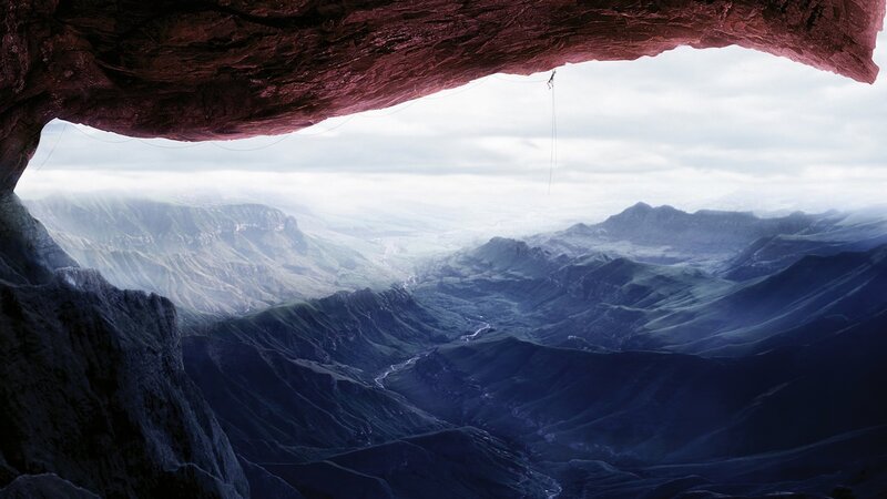 Climber in a vast canyon