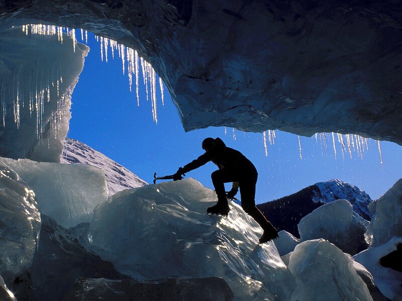Climber in an ice cave