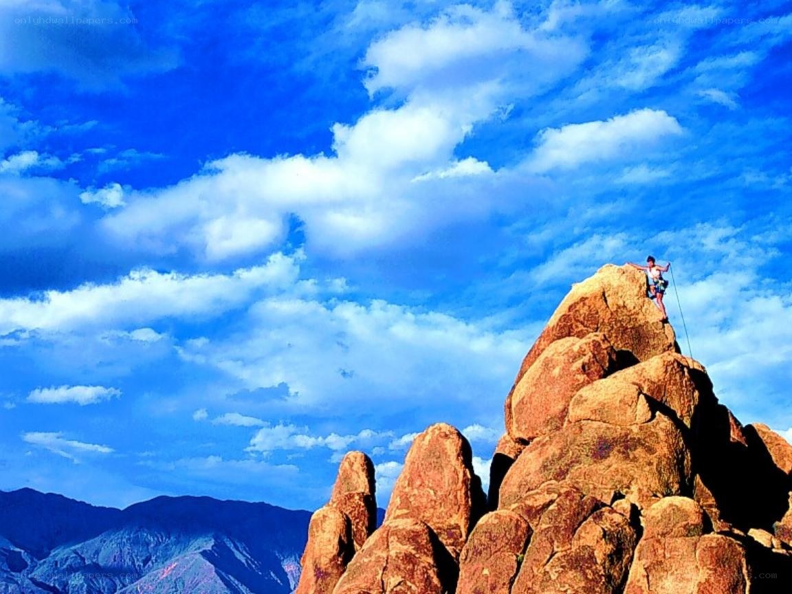 Climber on a rocky peak