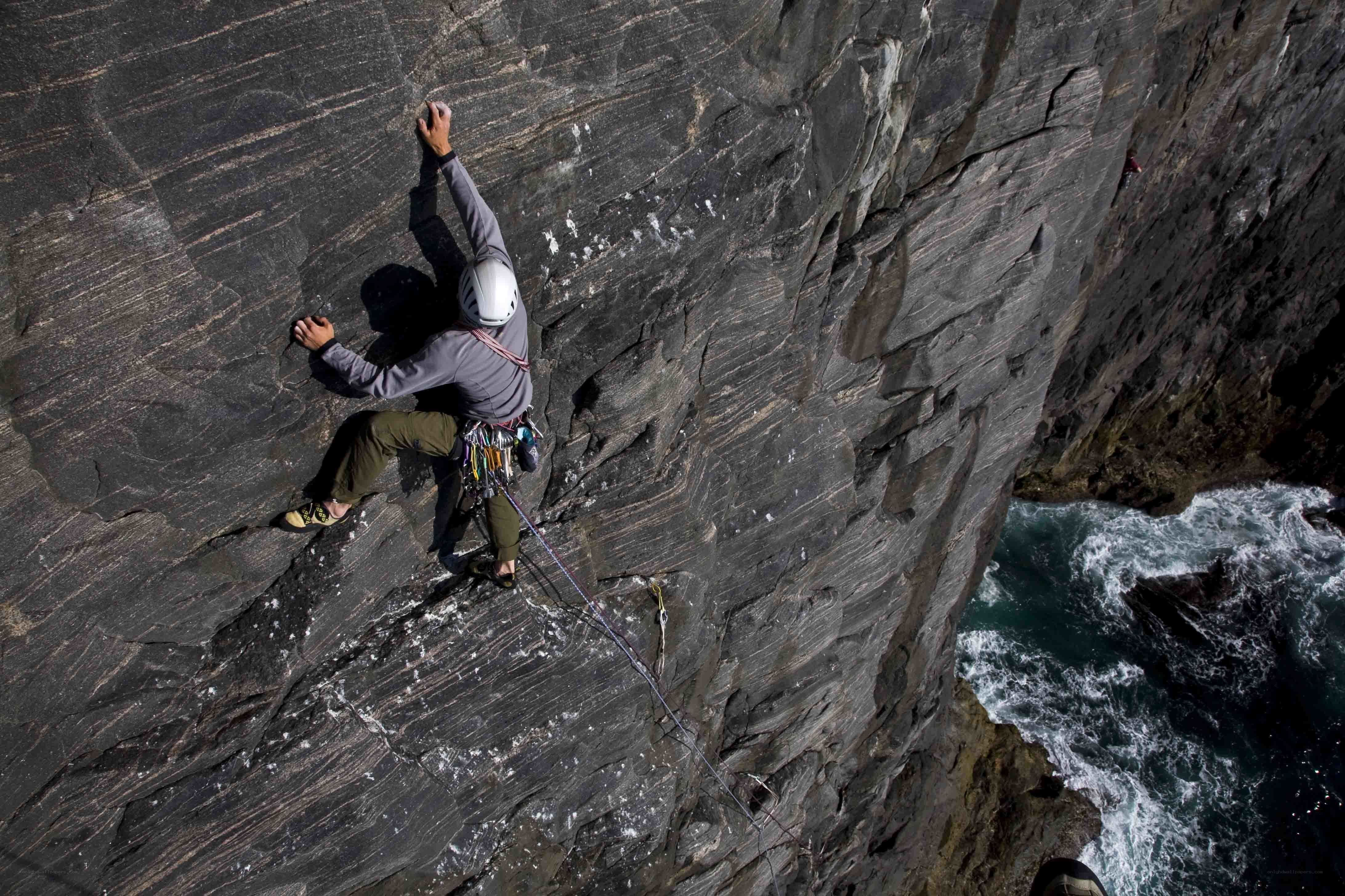Climber on a sea cliff