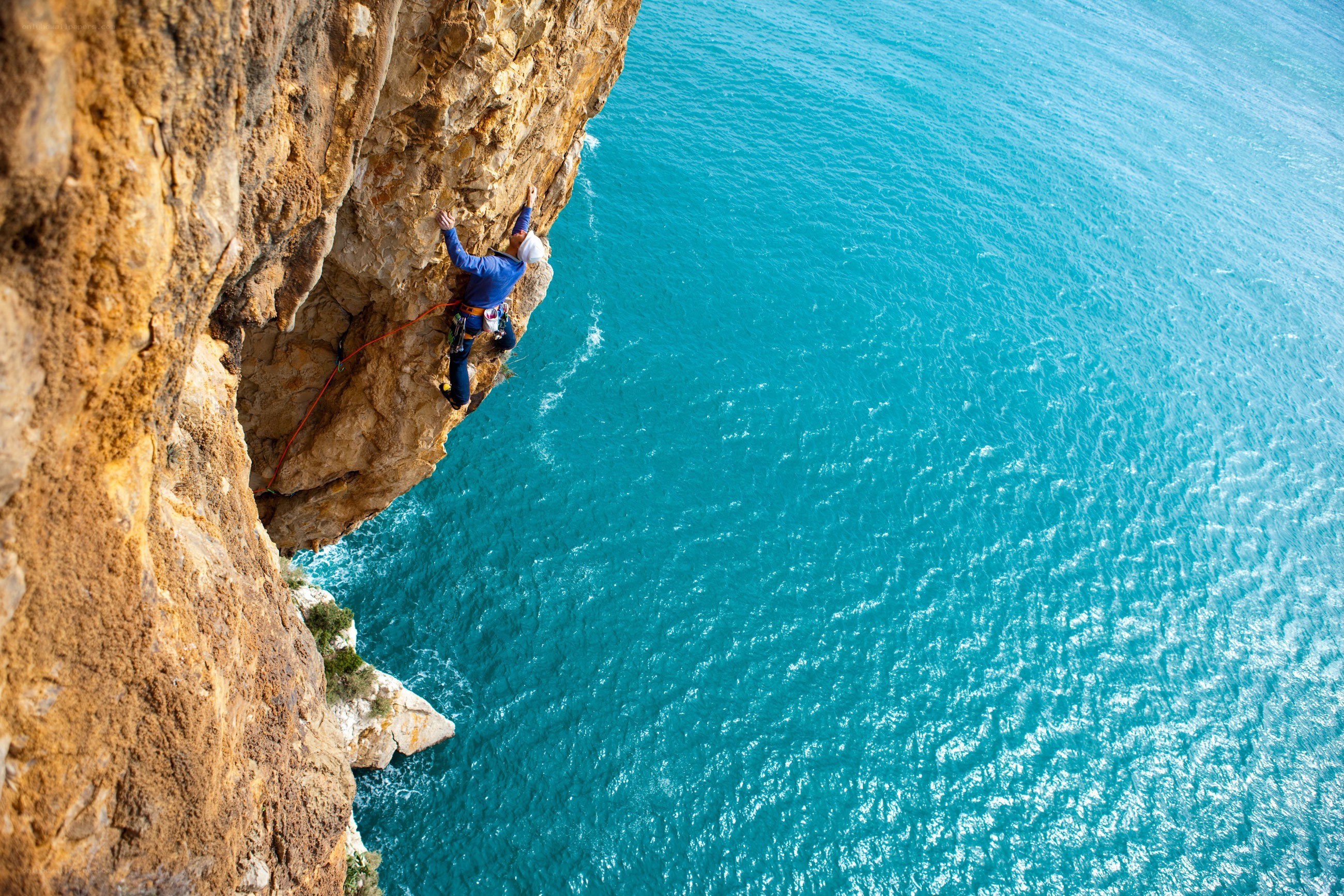 Climber on a sea cliff