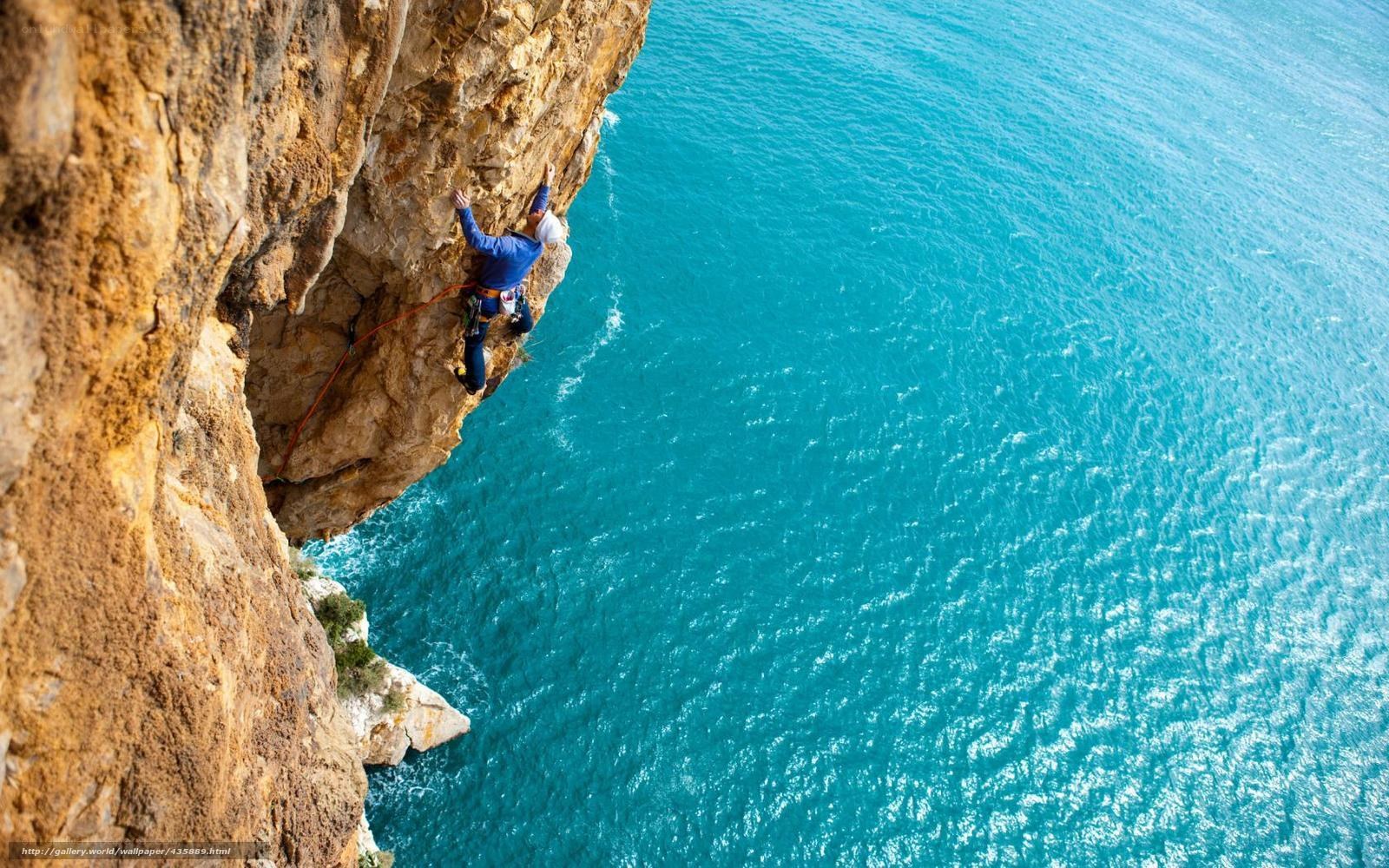 Climber on a sea cliff