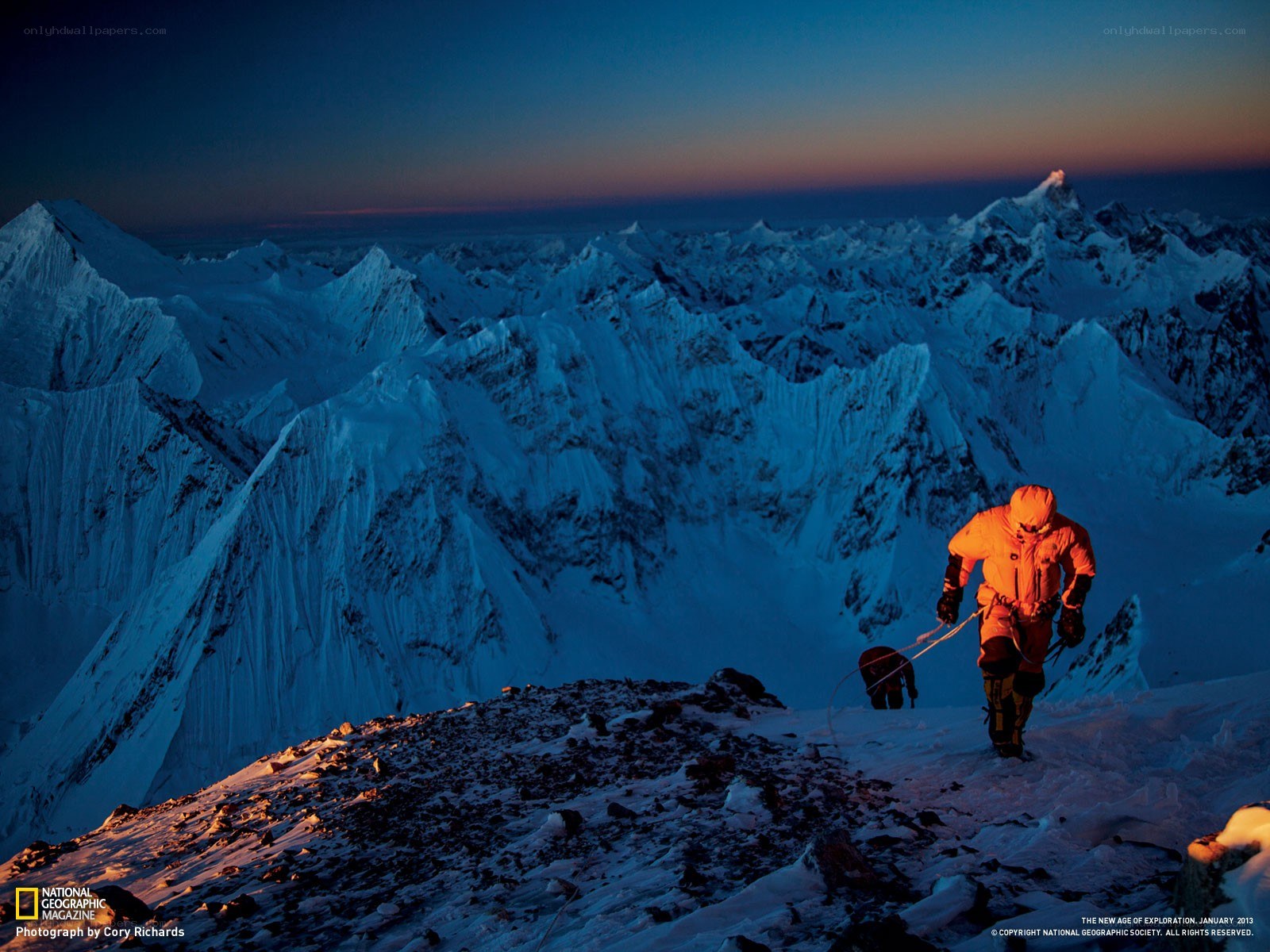 Climber on a snowy peak