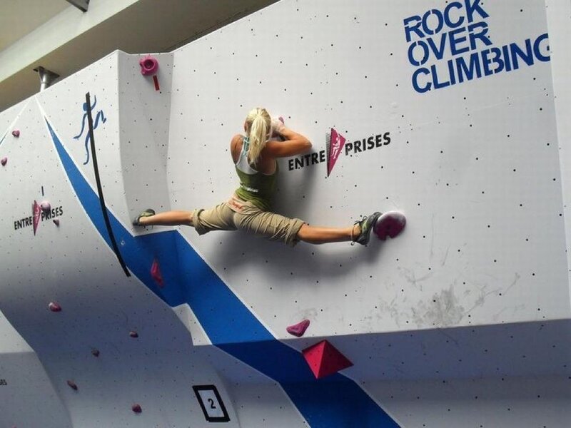 Climber on indoor wall