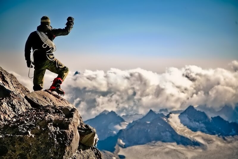 Climber on mountain peak