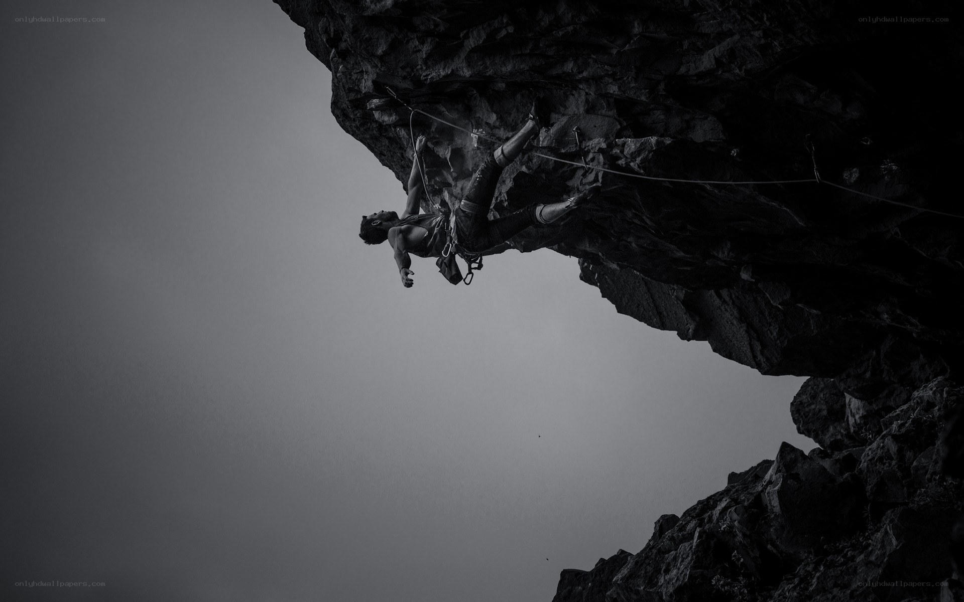 Climber on overhanging rock