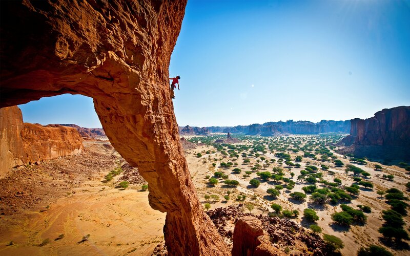 Climber on Rock Arch