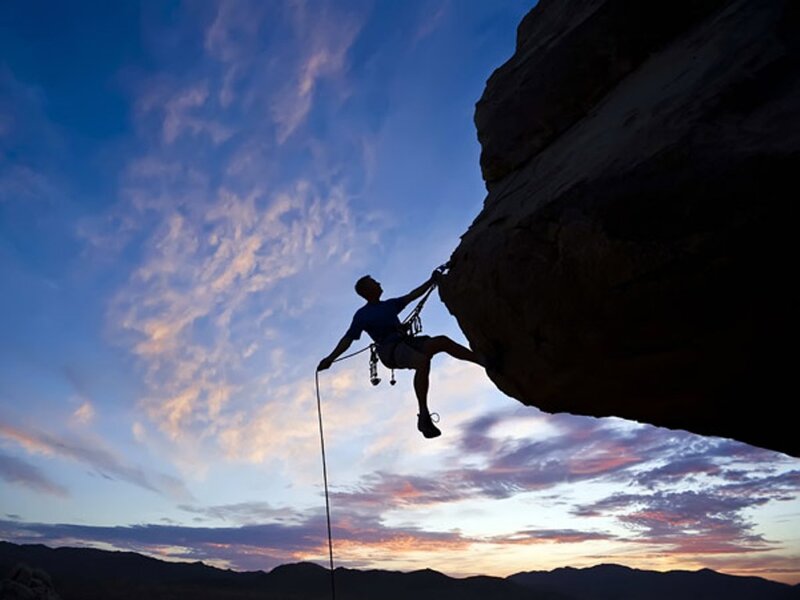 Climber on Rock Face — Blue, Dramatic, Sunset