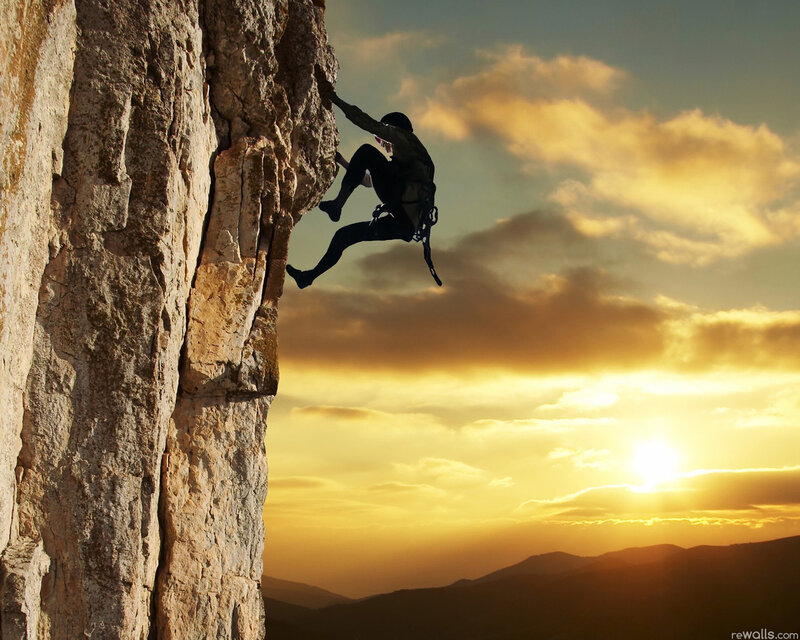 Climber on Rock Face — Gold