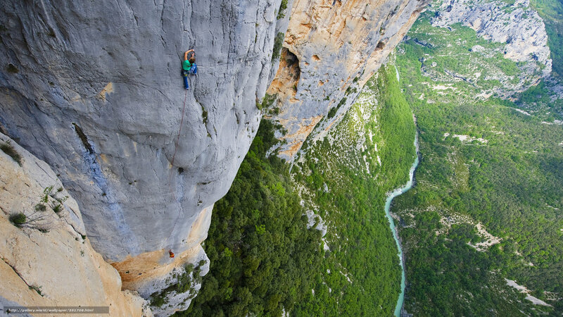 Climber on Rock Face — Green
