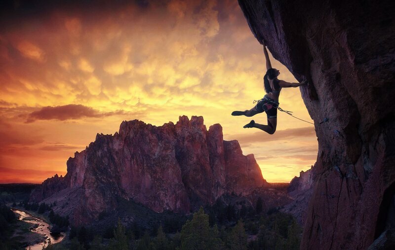 Climber on Rock Face — Orange, Dramatic