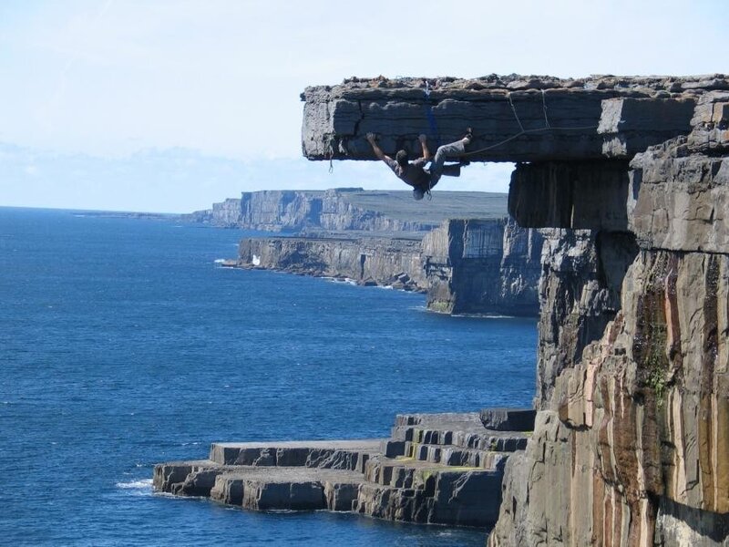 climber on sea cliff