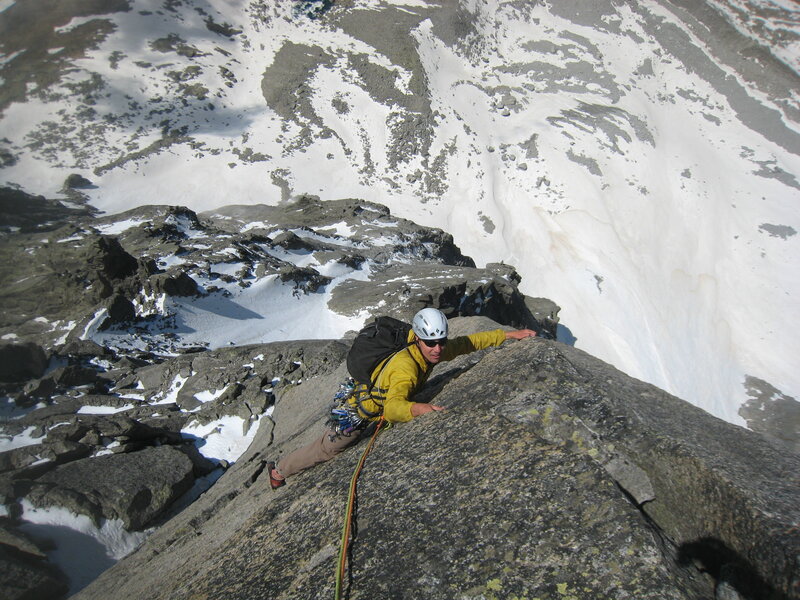 Climber on snowy mountain