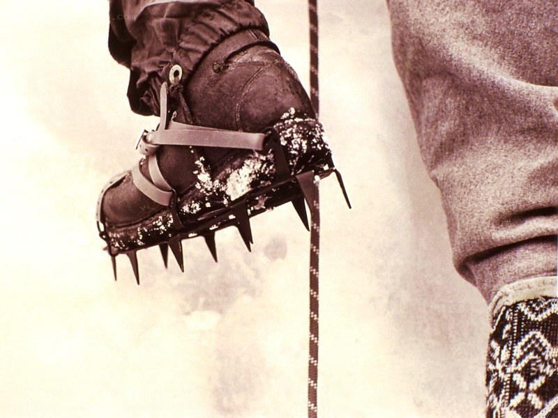 Climber's boot with crampons