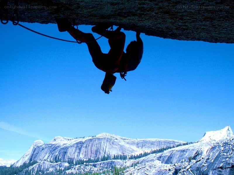 climber under an overhang