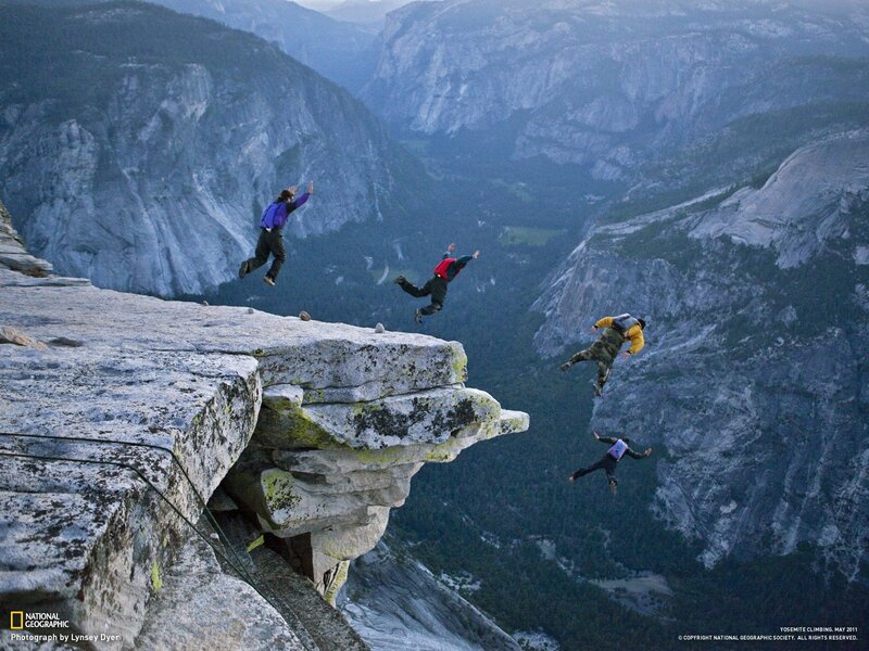 Climbers leap from cliff