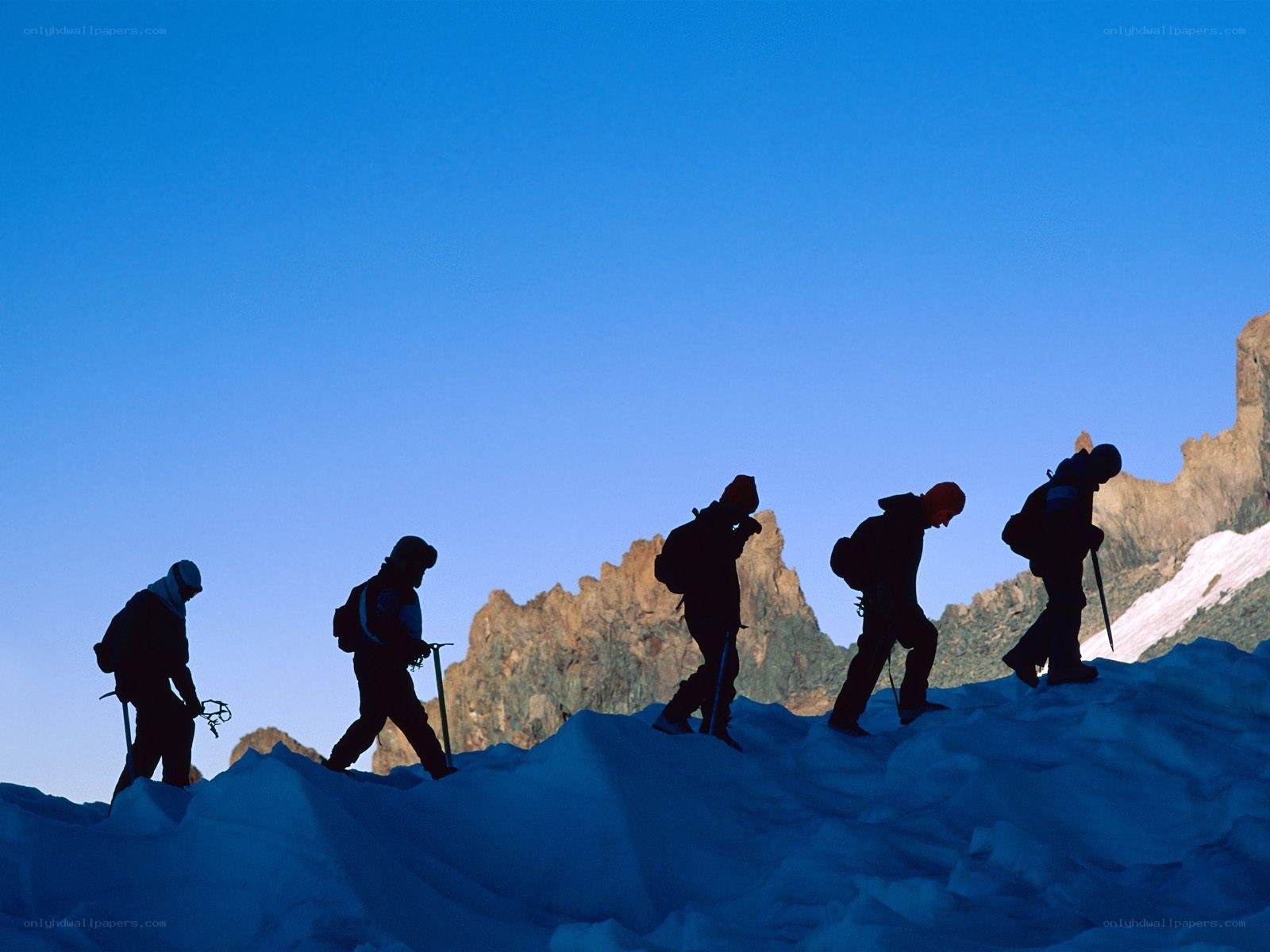 climbers on a glacier