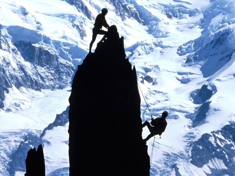 Climbers on a mountain peak