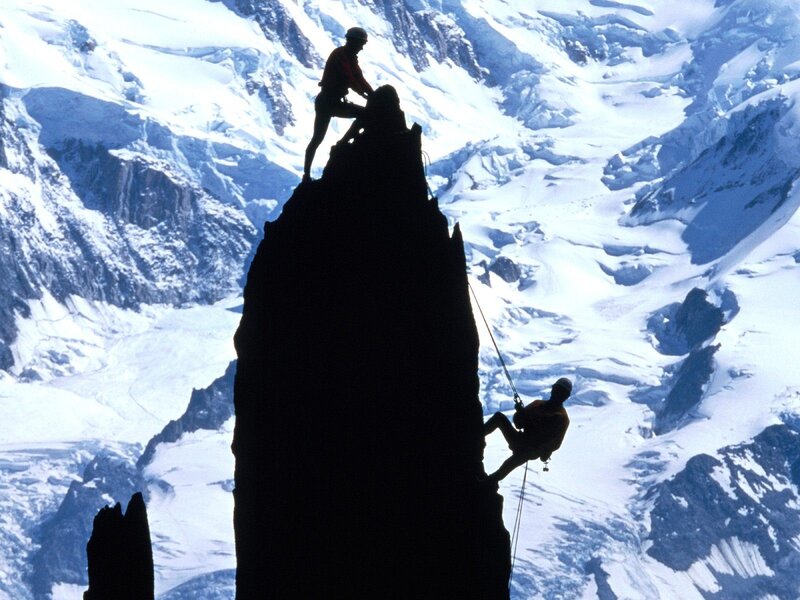 Climbers on a snowy mountain