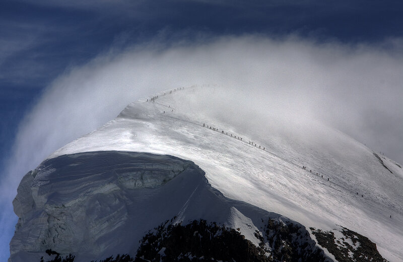 Climbers on Snowy Mountain