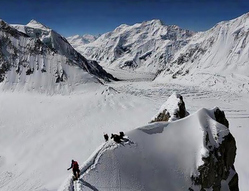 Climbers on Snowy Mountain — White