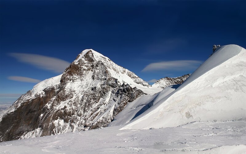 Climbers on Snowy Peak