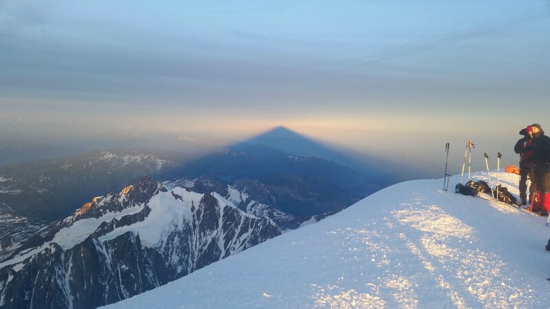 Climbers on Snowy Peak — White