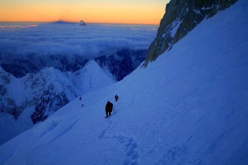 Climbers on Snowy Slope