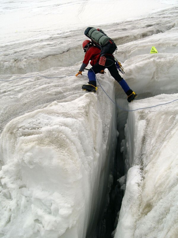 Climbing a glacier crevasse