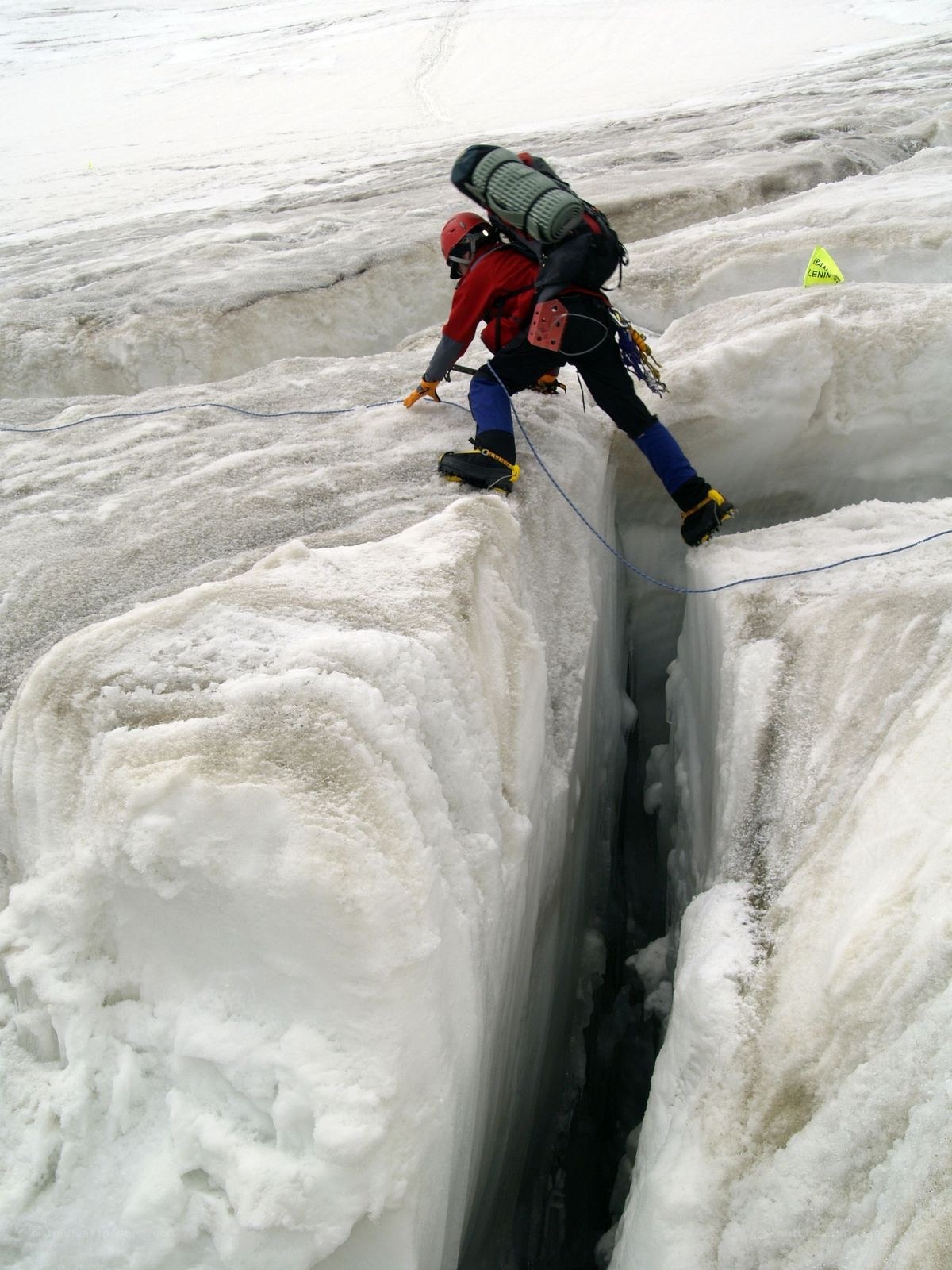 Climbing a glacier crevasse
