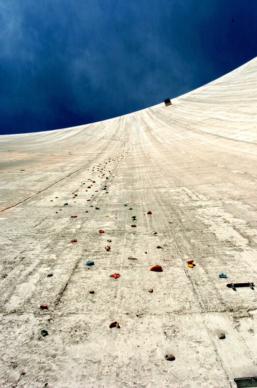 Climbing wall under blue sky