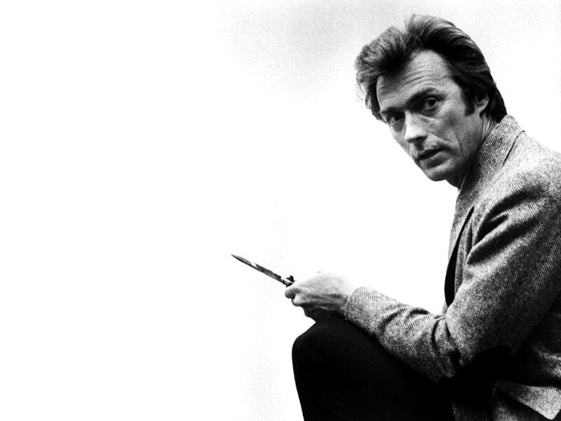 Clint Eastwood holding a knife