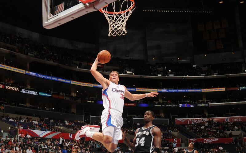 Clippers player dunks basketball