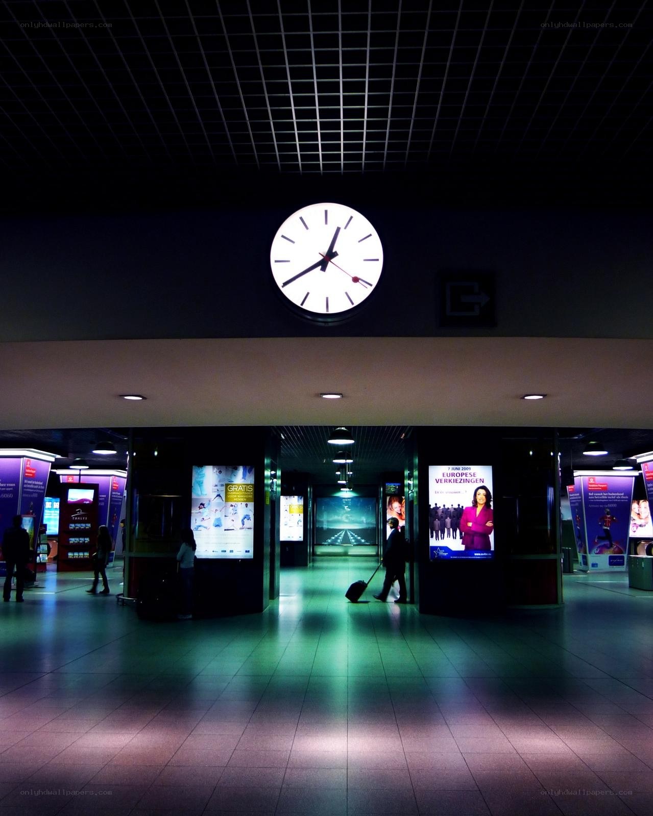 Clock in a dimly lit station