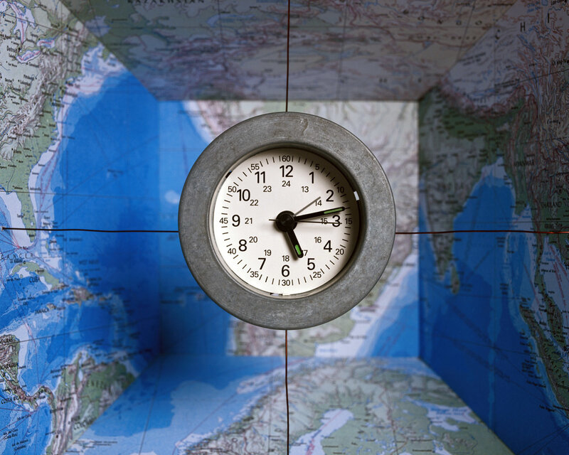 Clock in a map room