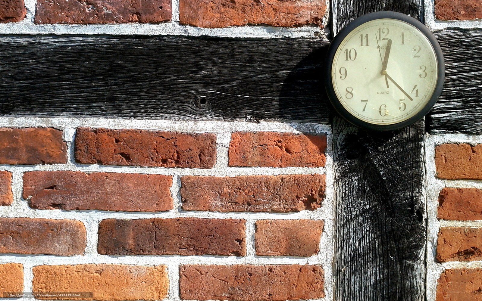 clock on brick wall
