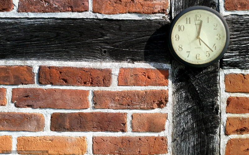 Clock on Brick Wall — Red