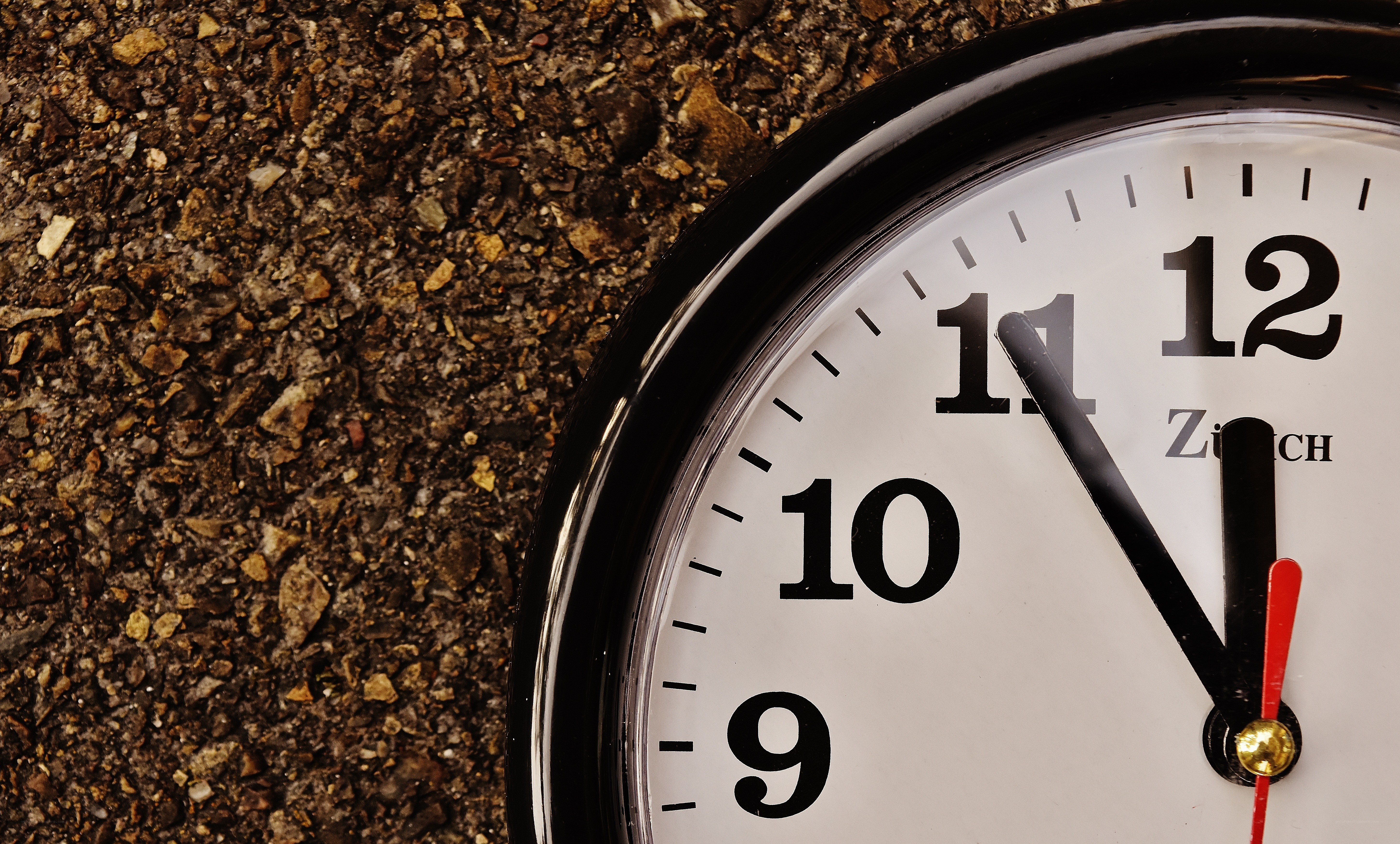 clock on gravel surface
