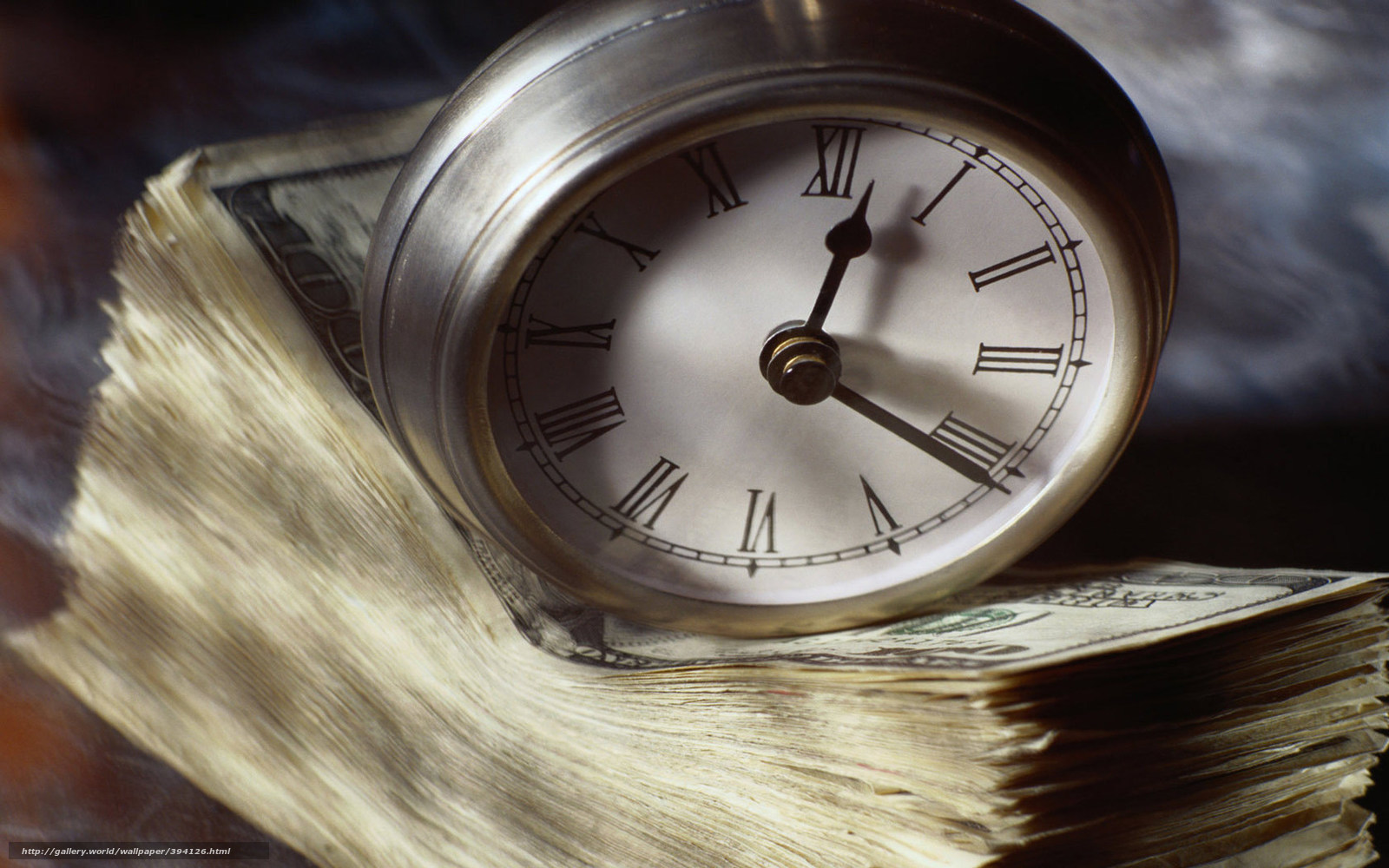 clock on money stack