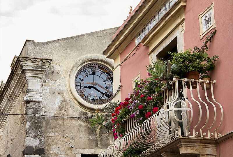 Clock on Stone Wall
