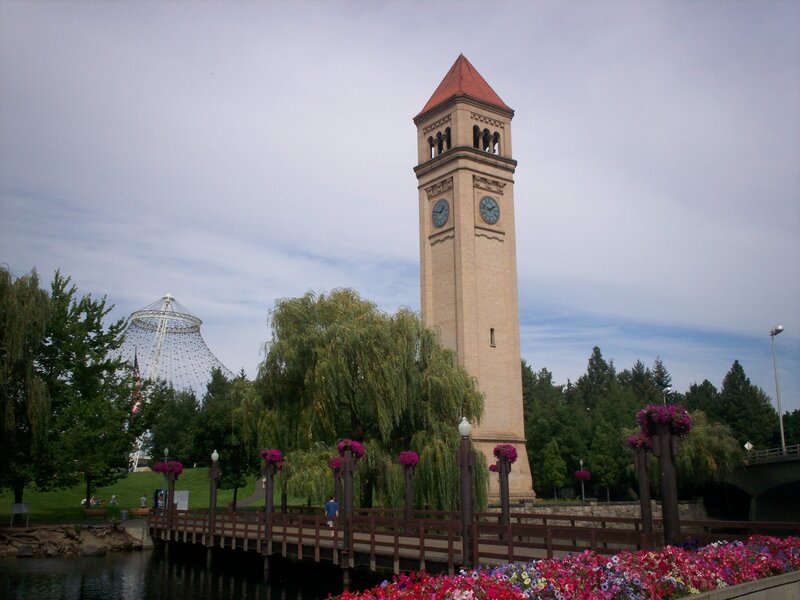 clock tower and flowers in park