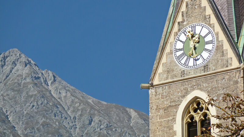 Clock Tower and Mountain