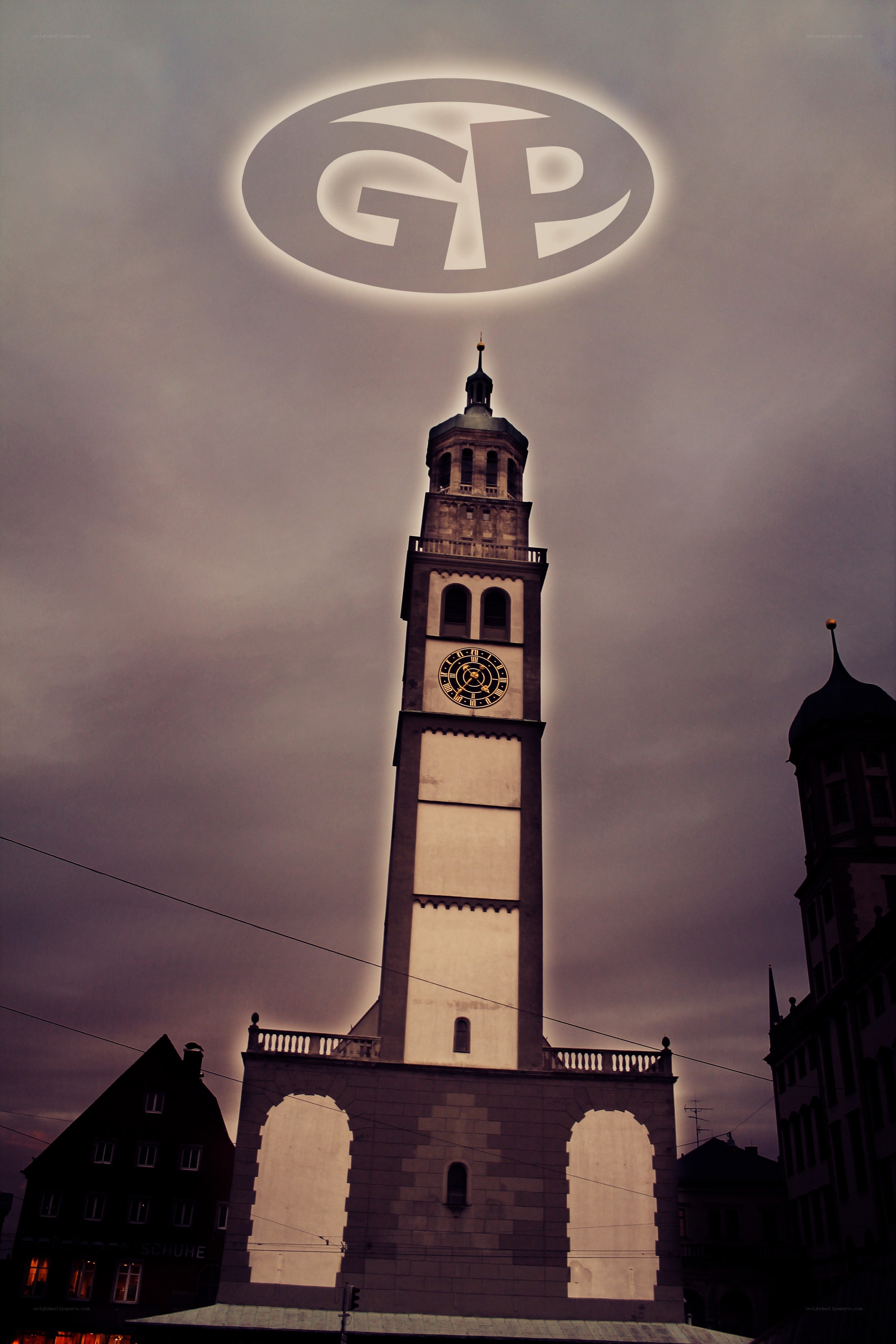 Clock tower with glowing logo