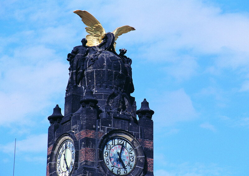 Clock tower with golden angel