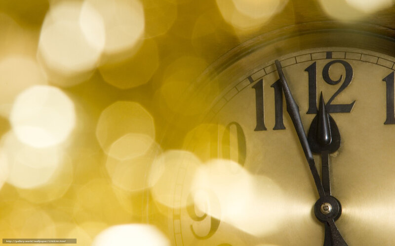 clock with golden bokeh background