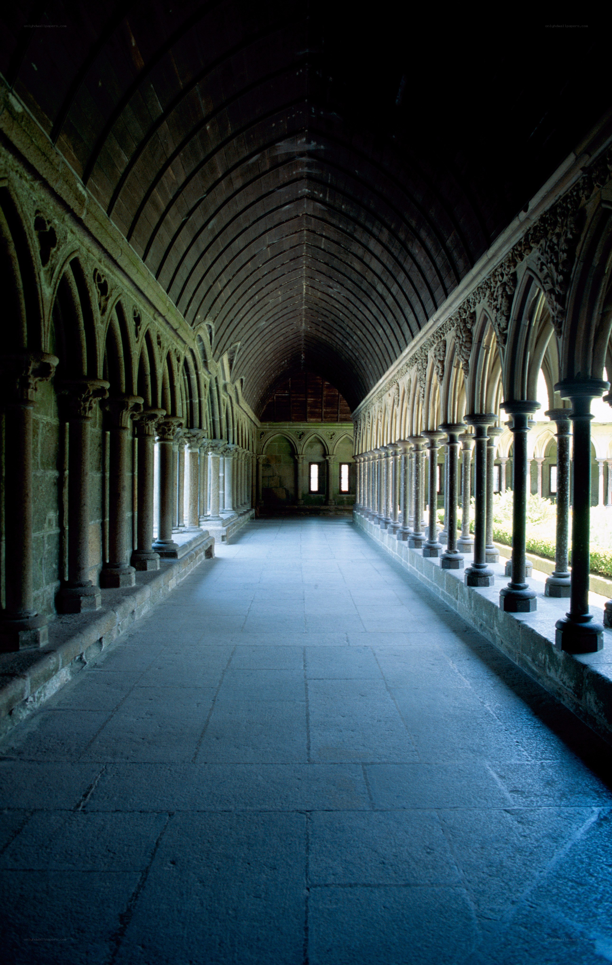 Cloister corridor with stone arches