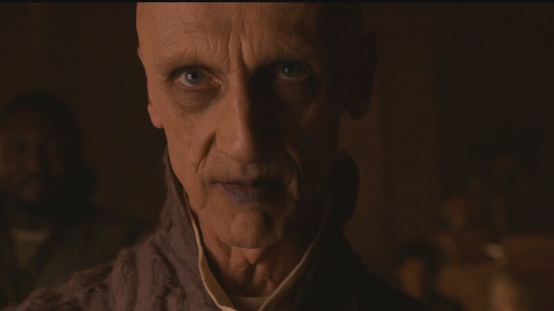 close-up of a bald man