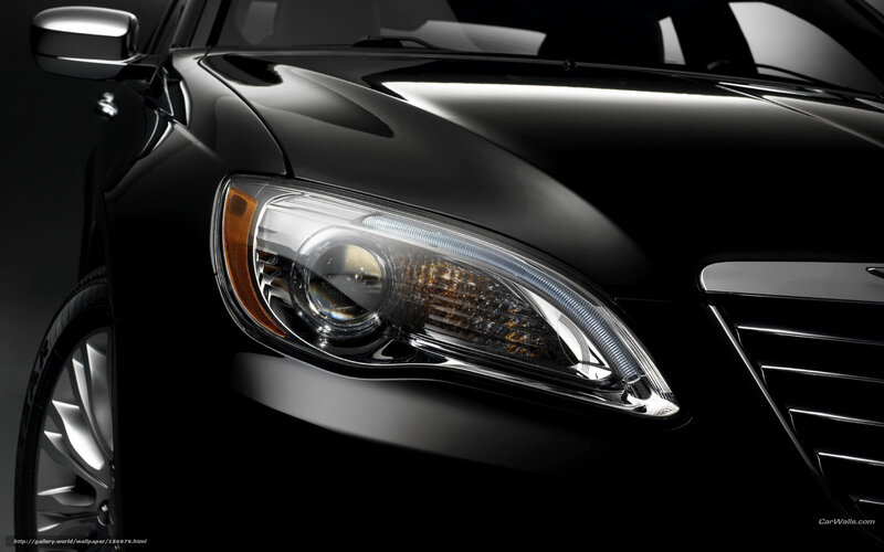 Close-up of a black car headlight