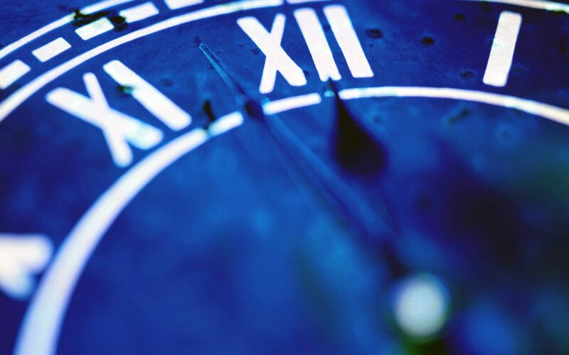 Close-up of a blue clock face