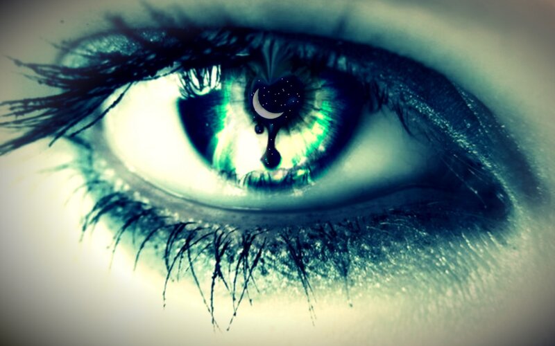 Close-up of a Blue Eye — Dramatic, Night